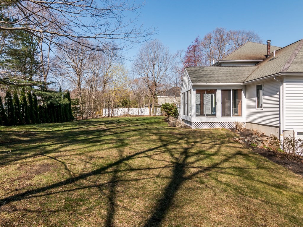 7 Old Town Road Beverly, MA 01915 - Photo 5 of 35 a front view of a house with a yard