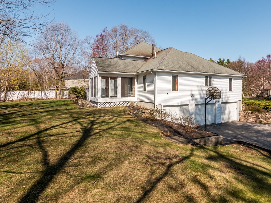 7 Old Town Road Beverly, MA 01915 - Photo 6 of 35 a front view of a house with a yard