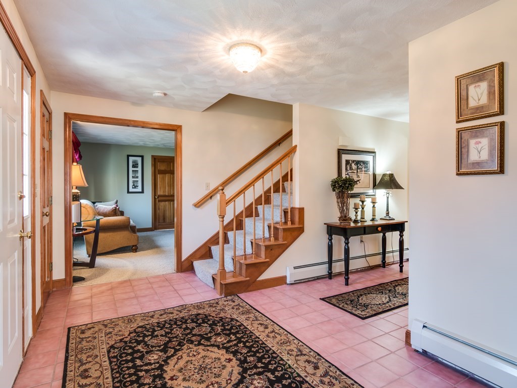 7 Old Town Road Beverly, MA 01915 - Photo 9 of 35 a bedroom with furniture and a rug