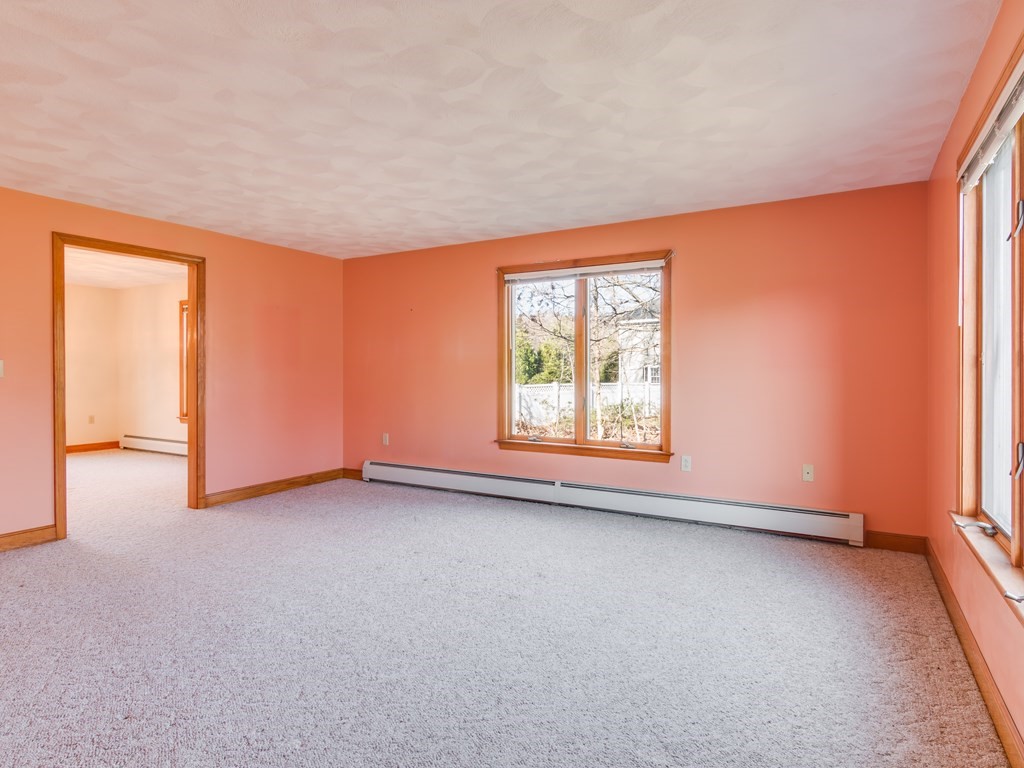 7 Old Town Road Beverly, MA 01915 - Photo 10 of 35 an empty room with a window