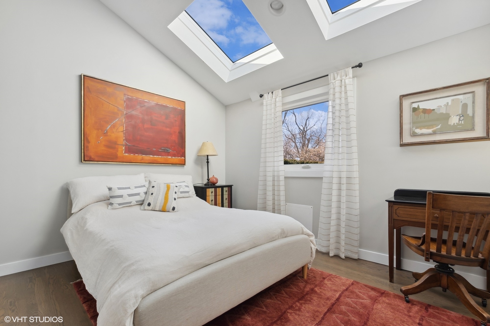 668 Sunset Ridge Road Northfield, IL 60093 - Photo 30 of 43 a bedroom with a bed and a table