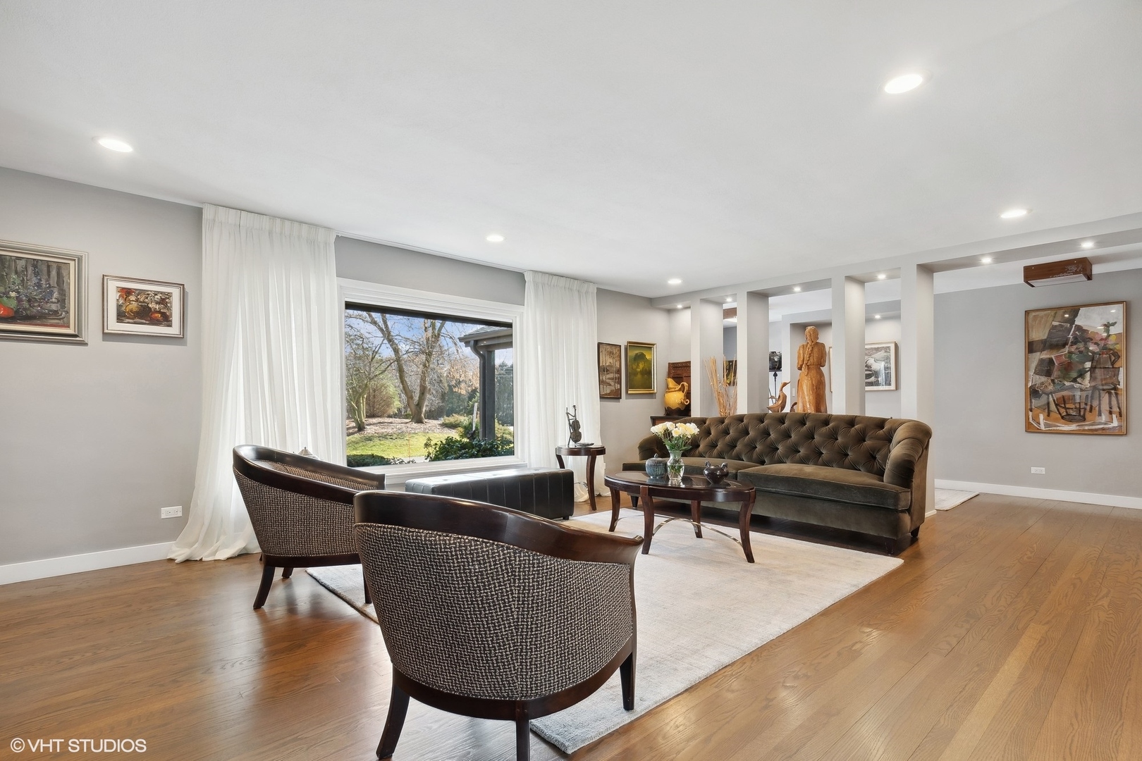 668 Sunset Ridge Road Northfield, IL 60093 - Photo 5 of 43 a living room with furniture and a large window