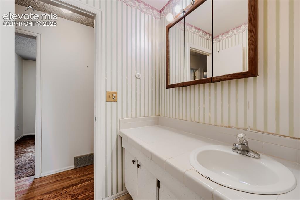 4618 Ridgeglen Road Colorado Springs, CO 80918 - Photo 16 of 27 Main floor bathroom