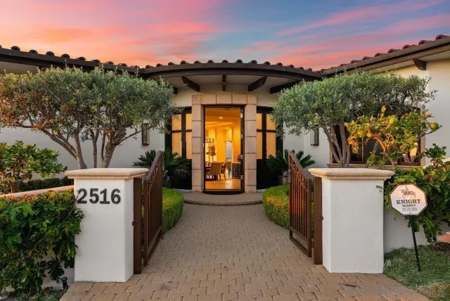 a spacious bedroom with a bed and a couch