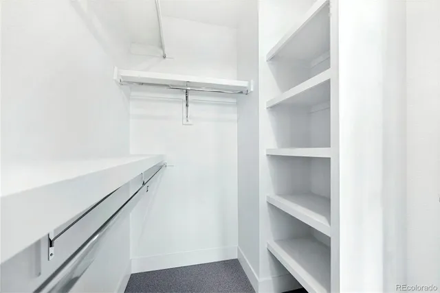 a view of an empty walk in closet