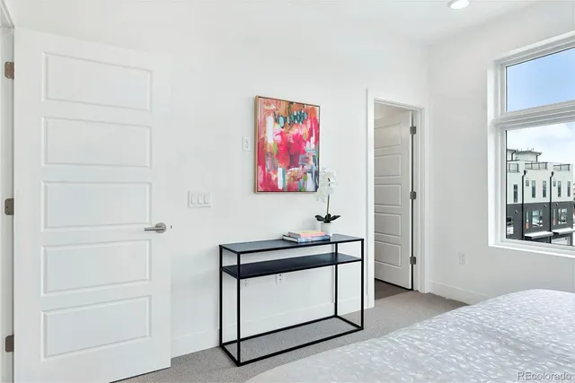 a bedroom with a bed and a cabinets