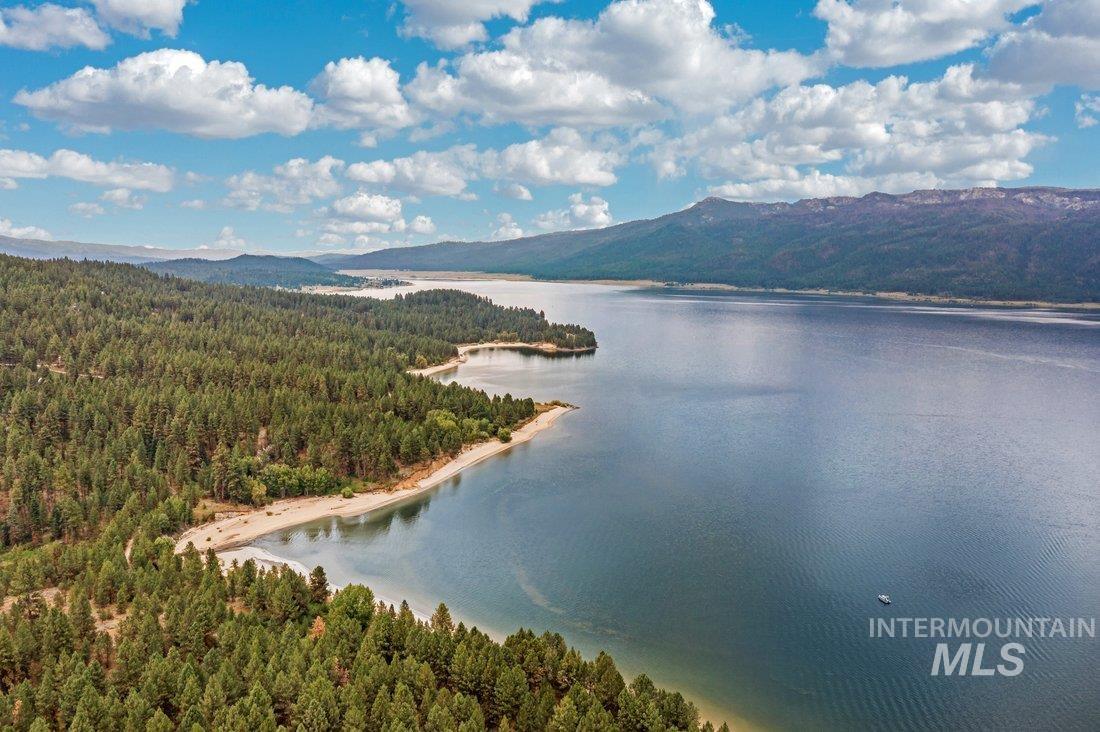 79 Sunset Loop Cascade, ID 83611 - Photo 44 of 44 Expansive waterfront property featuring a sandy shoreline and dense evergreen forests