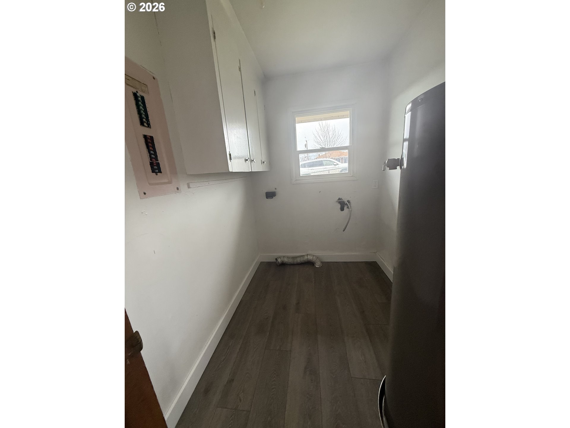 805 Southeast 6th Street Pendleton, OR 97801 - Photo 11 of 32 a view of a hallway with wooden floor and entryway