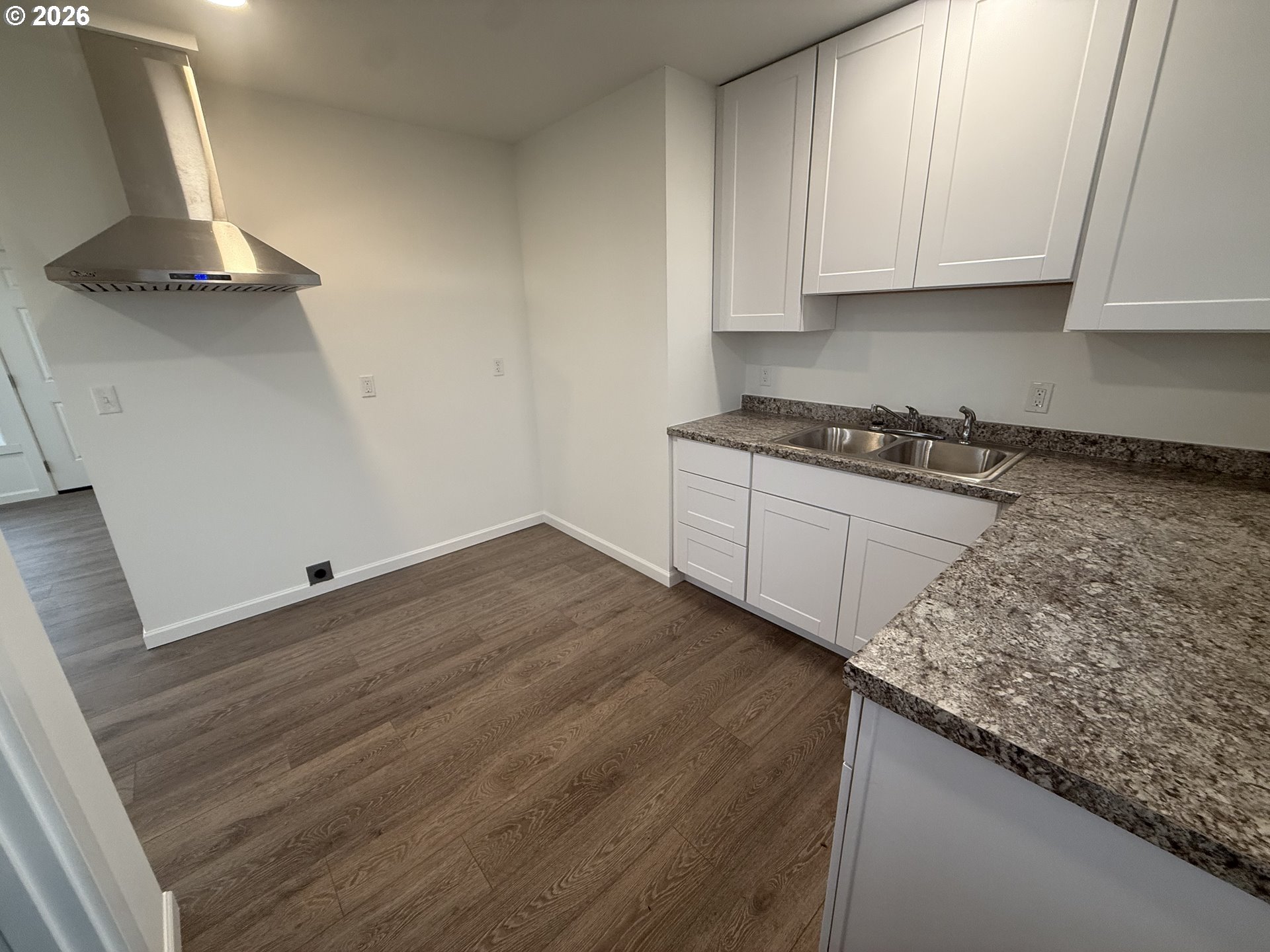 805 Southeast 6th Street Pendleton, OR 97801 - Photo 22 of 32 a kitchen with granite countertop a sink and a stove