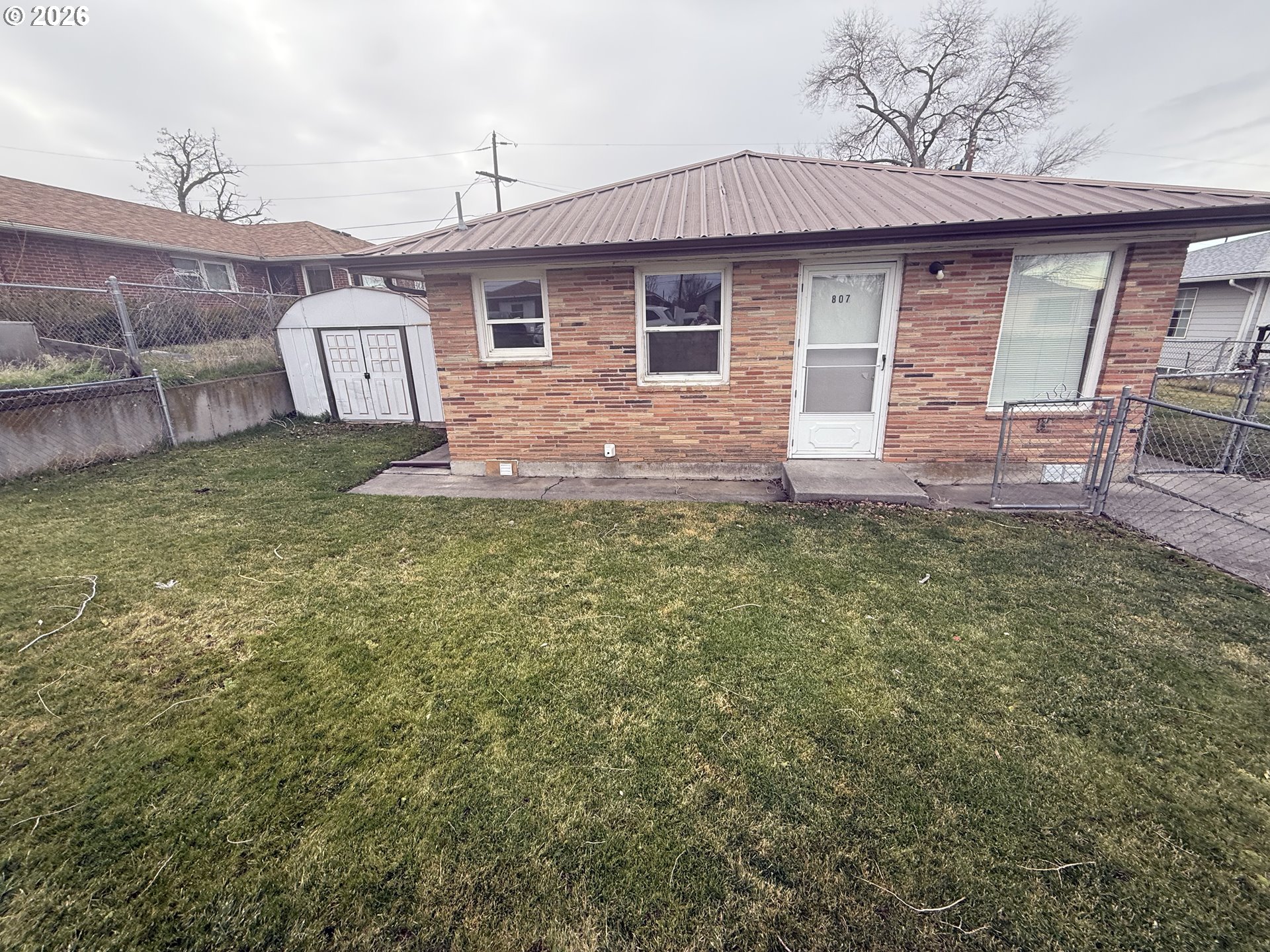 805 Southeast 6th Street Pendleton, OR 97801 - Photo 4 of 32 a view of a house with a yard
