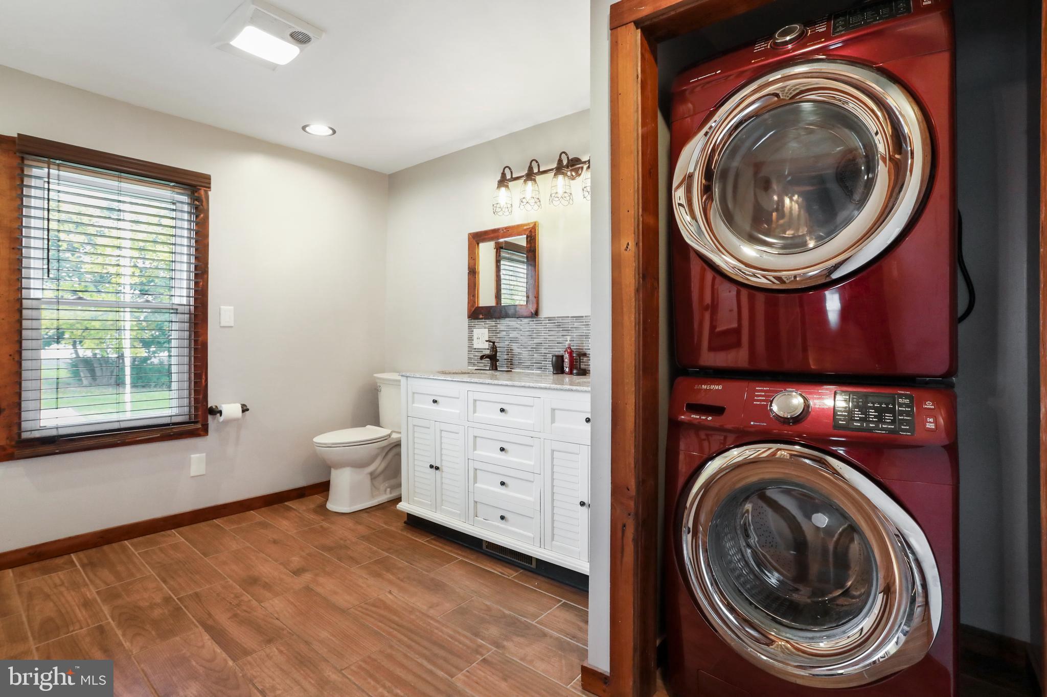 12354 Back Road Toms Brook, VA 22660 - Photo 20 of 58 Bathroom with stackable washer/dryer