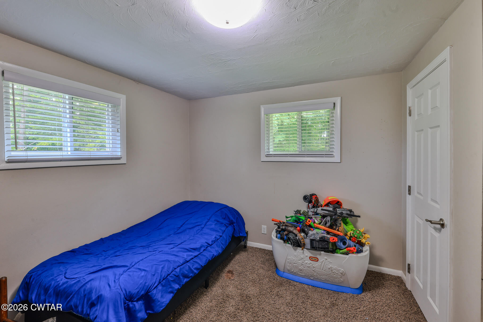 25 Shady Lane Huntingdon, TN 38344 - Photo 9 of 16 a bedroom with a bed and a window