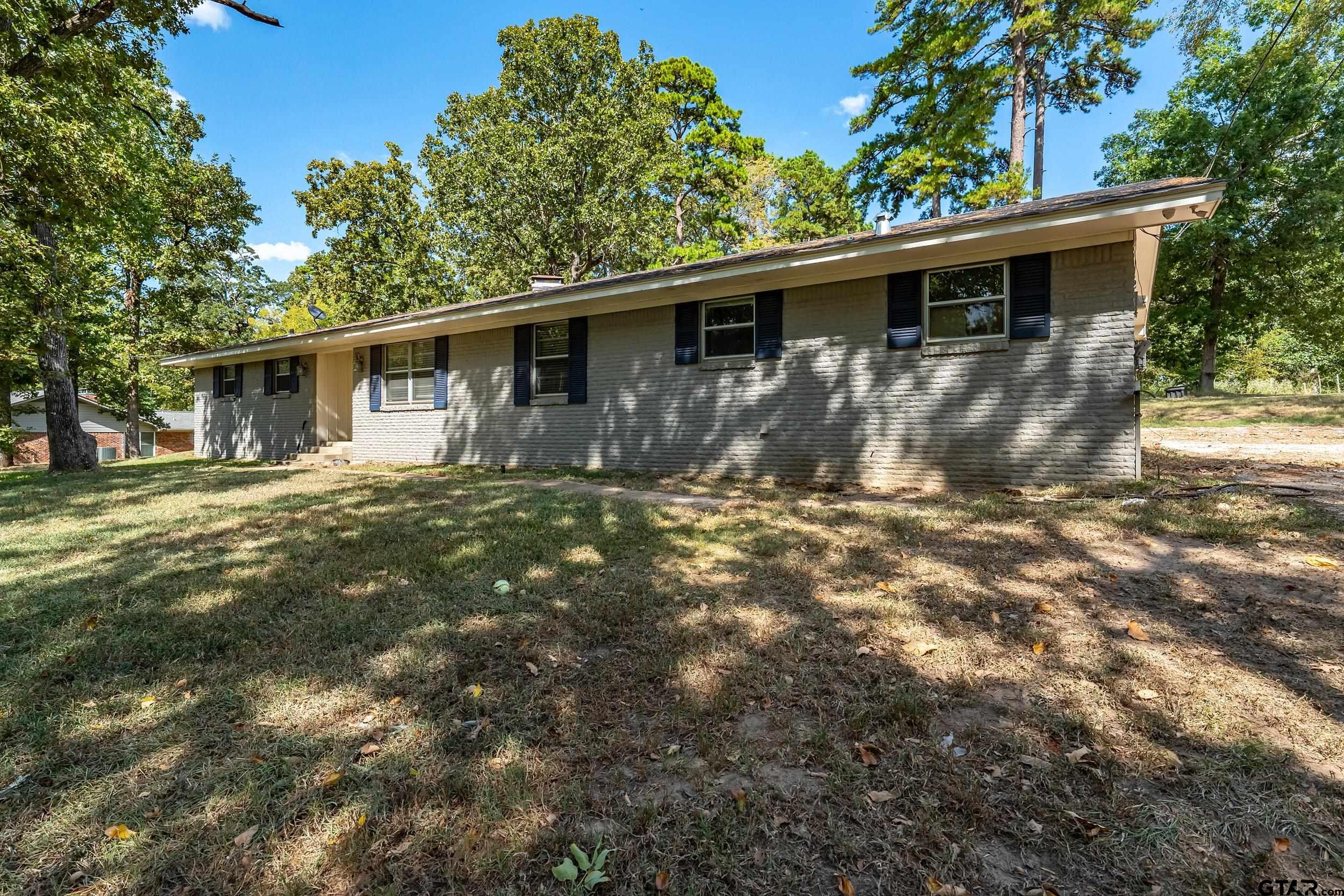 a front view of house with yard