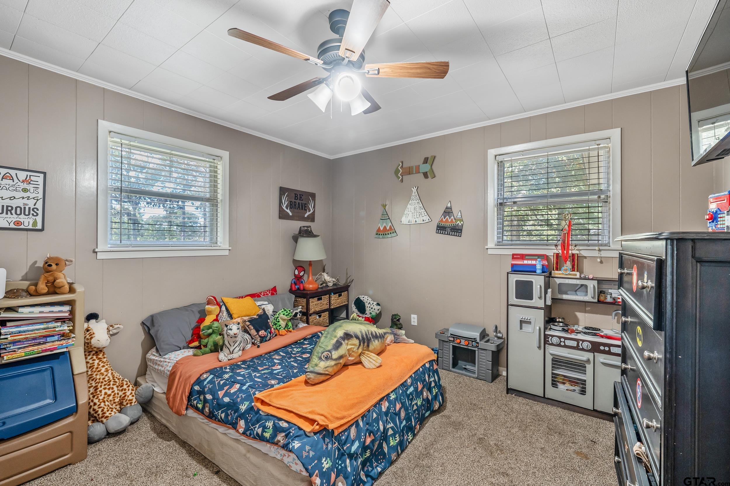 271 Nottingham Rusk, TX 75785 - Photo 16 of 23 a room with furniture a flat screen tv and a window