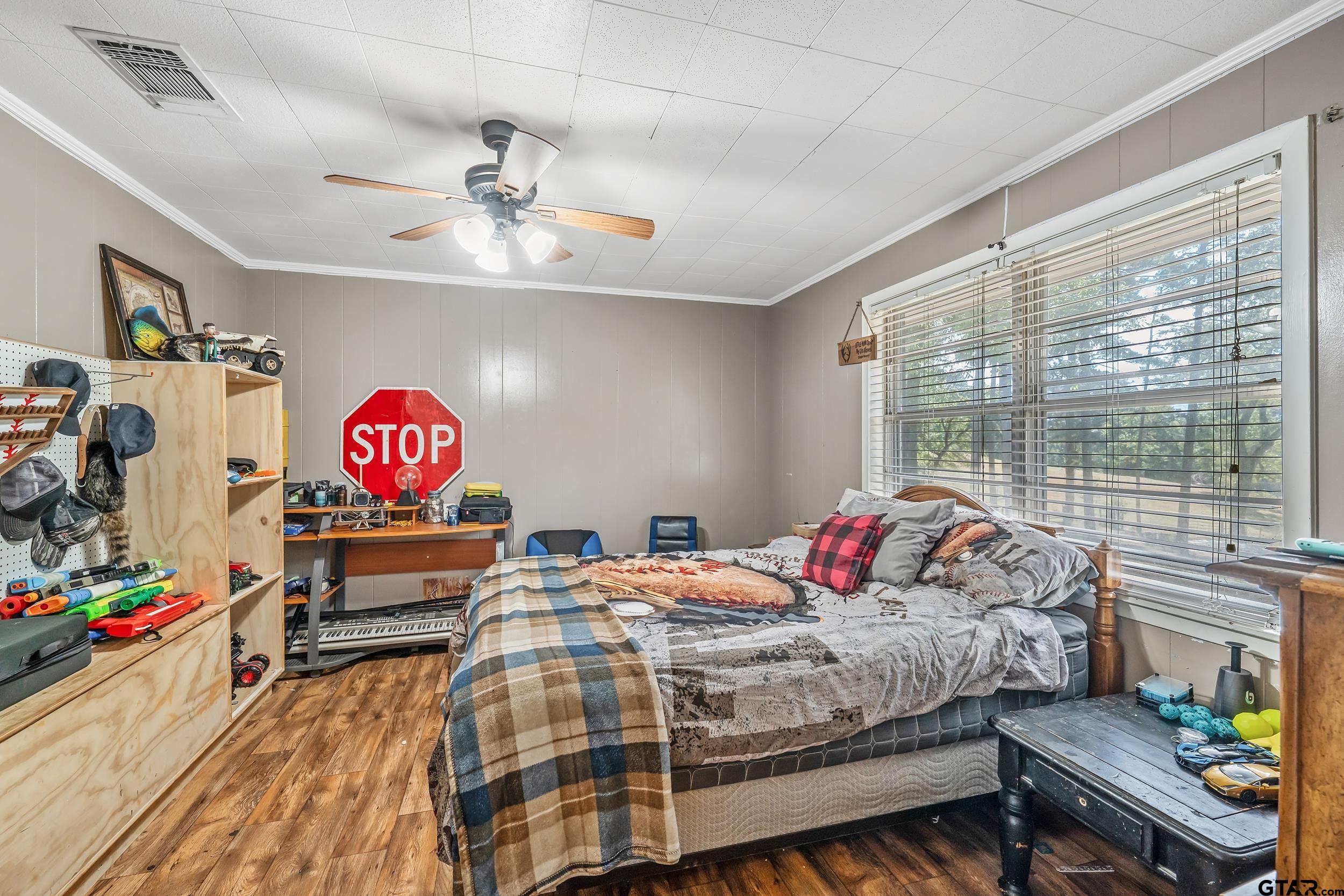 271 Nottingham Rusk, TX 75785 - Photo 19 of 23 a bedroom with bed and a large window