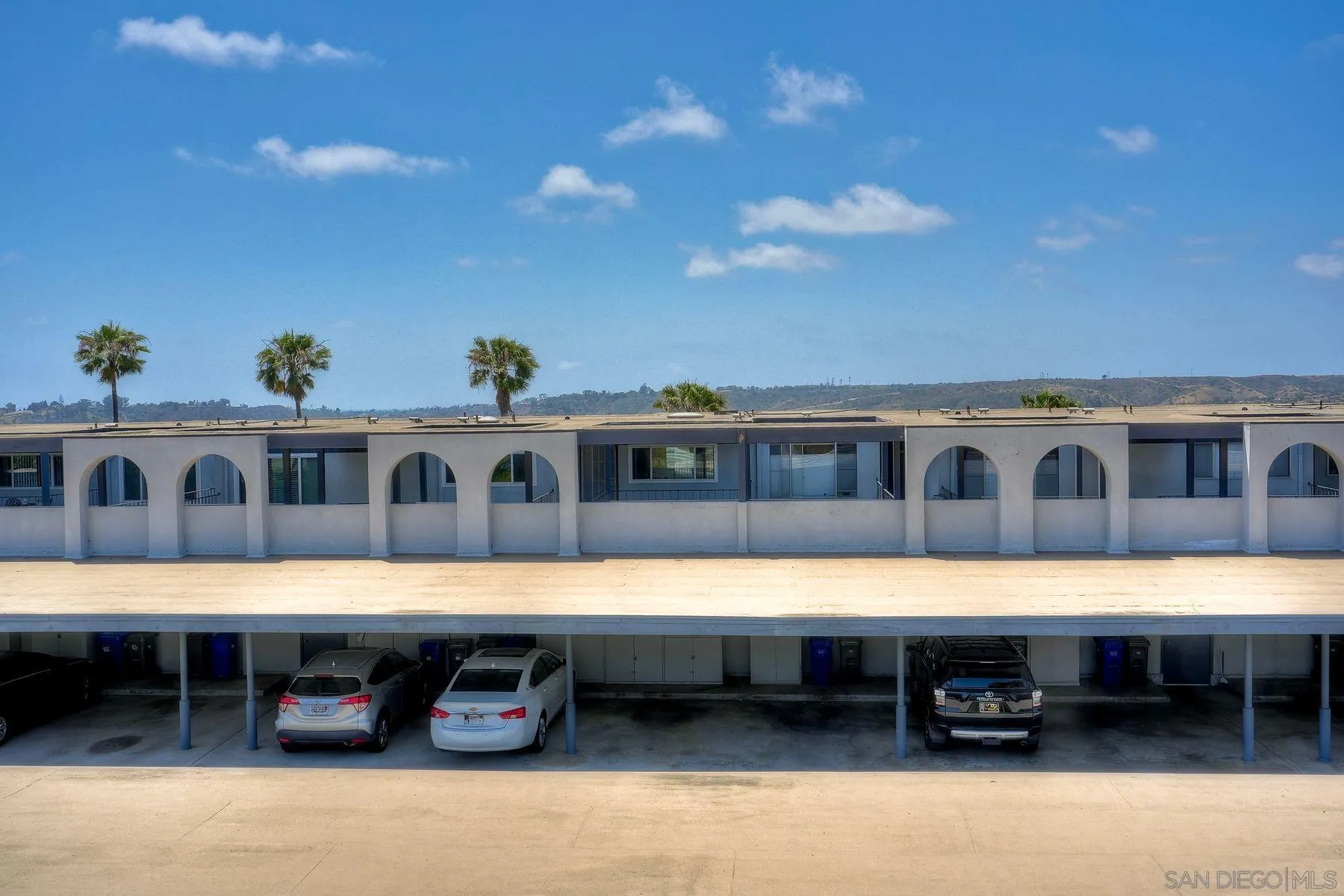 3606 Vista Rey, Unit 46 Oceanside, CA 92057 - Photo 36 of 36 a front view of a house with a yard