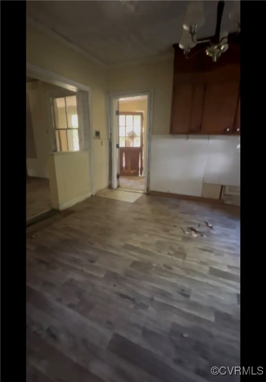 10618 Rives Avenue McKenney, VA 23872 - Photo 4 of 10 a view of empty room with wooden floor and fan