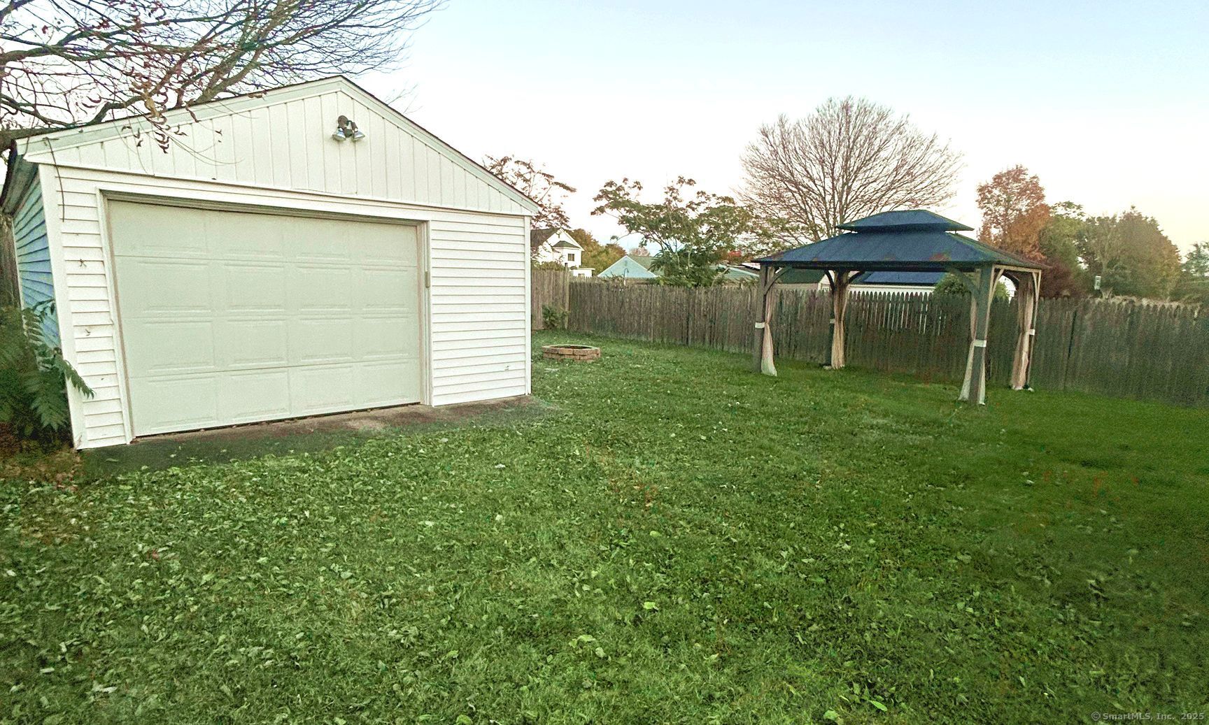 35 Hewey Street Waterbury, CT 06708 - Photo 2 of 14 a backyard of a house with lots of green space