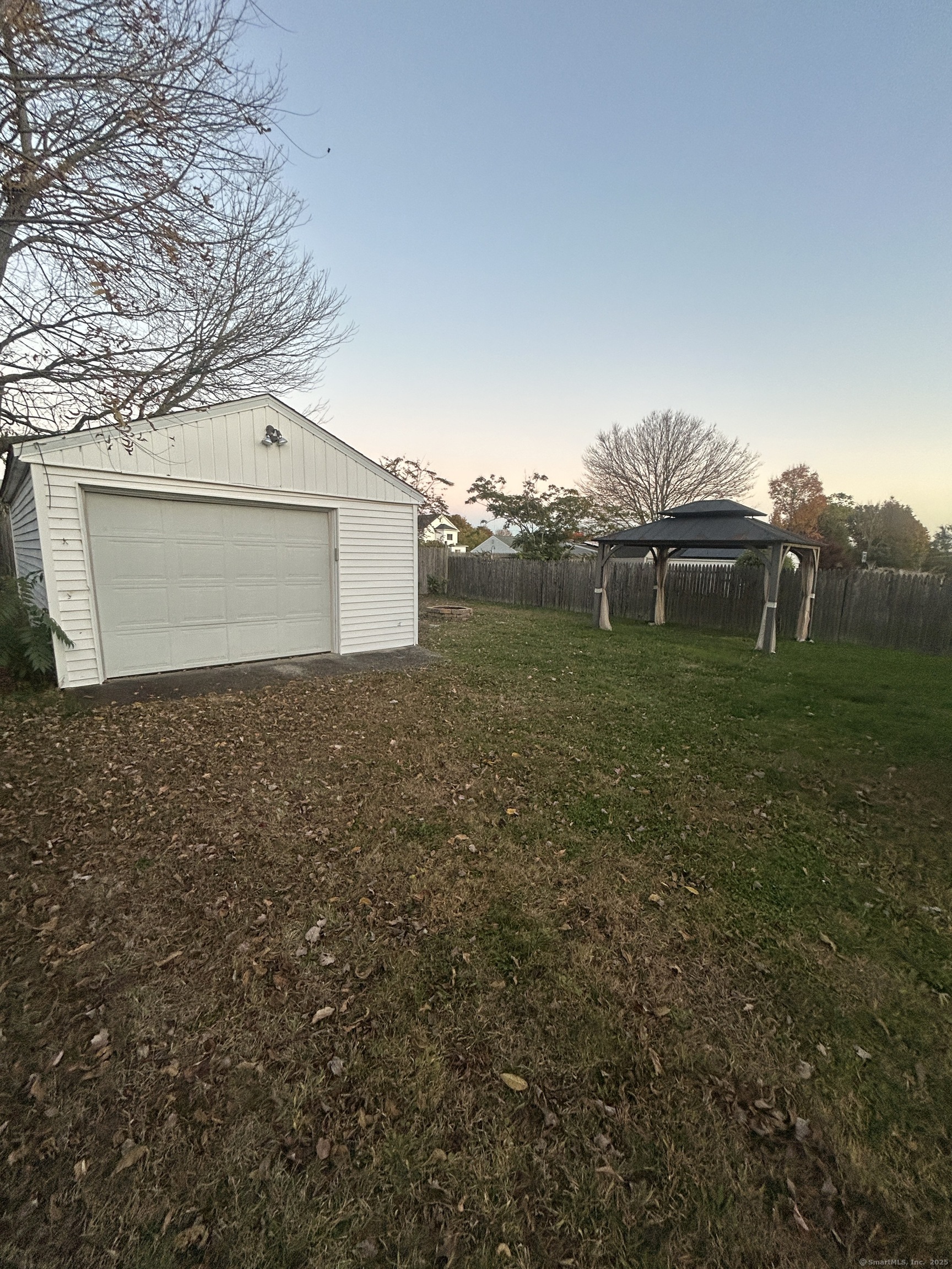 35 Hewey Street Waterbury, CT 06708 - Photo 10 of 14 a backyard of a house with lots of green space