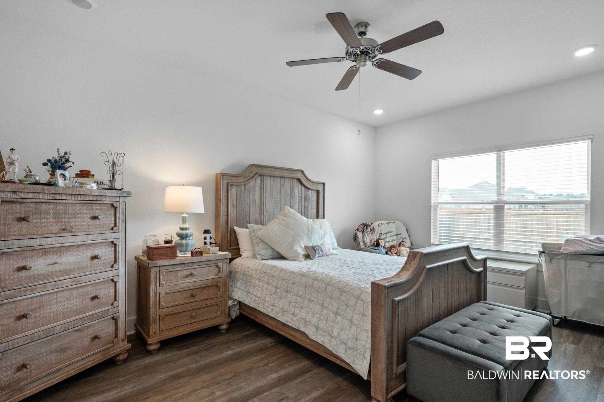 8508 Rosedown Lane Daphne, AL 36526 - Photo 19 of 29 Bedroom with dark wood-style floors, ceiling fan, and recessed lighting