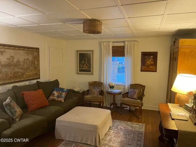 a living room with furniture and a couch