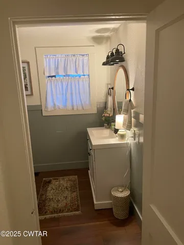a bathroom with a sink and a toilet