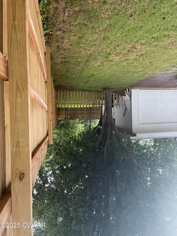 a view of a balcony with an outdoor space