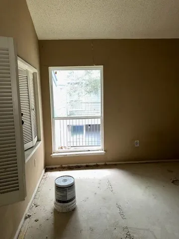 a view of balcony with furniture