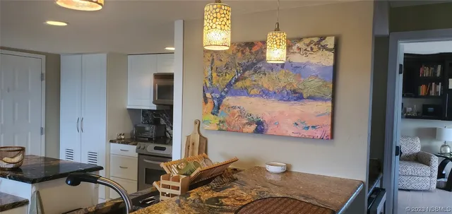 a workspace with furniture and window