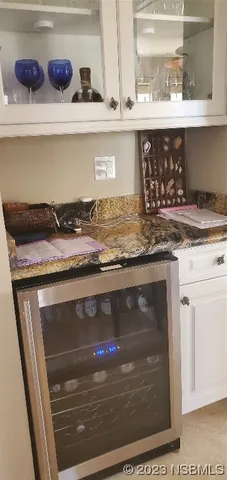 a stove top oven sitting inside of a kitchen