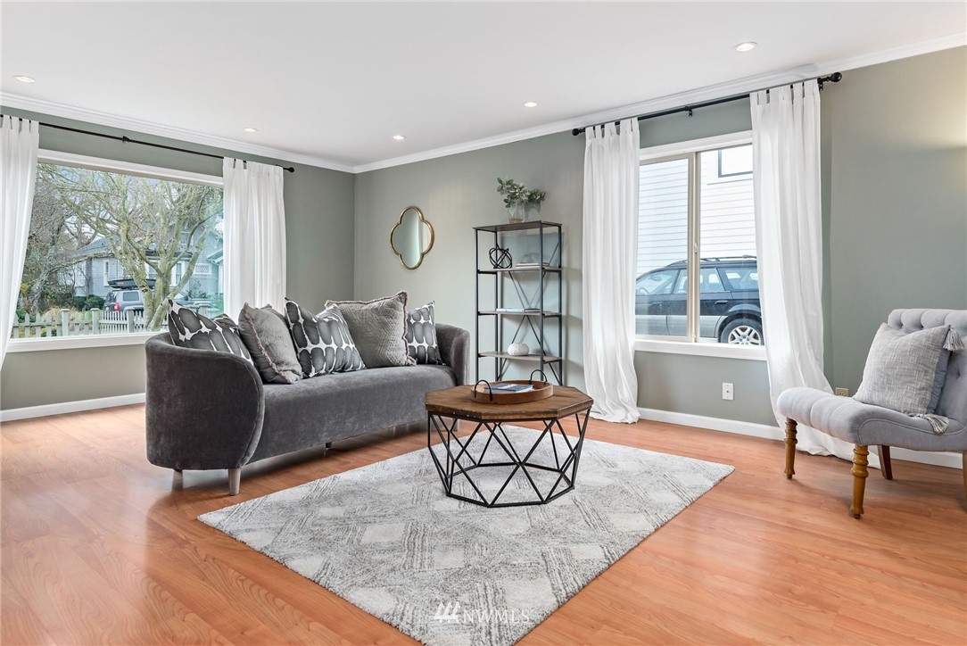 528 North 74th Street Seattle, WA 98103 - Photo 11 of 34 a living room with furniture and a large window