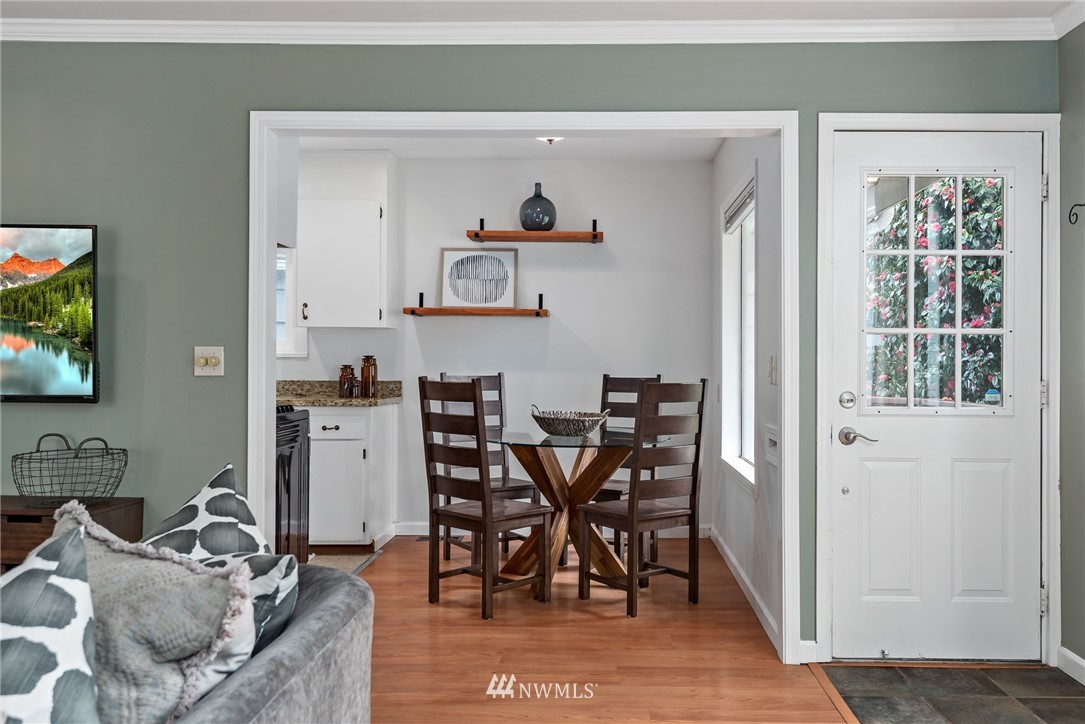 528 North 74th Street Seattle, WA 98103 - Photo 15 of 34 a view of a dining room with furniture