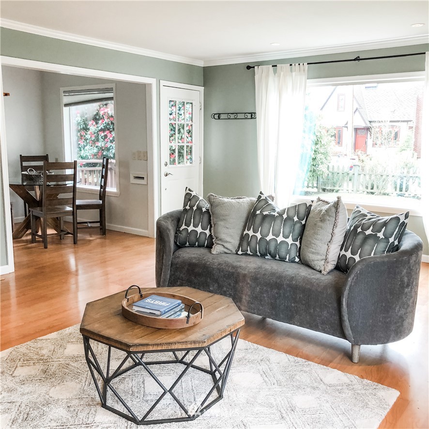 528 North 74th Street Seattle, WA 98103 - Photo 7 of 34 a living room with furniture and a large window