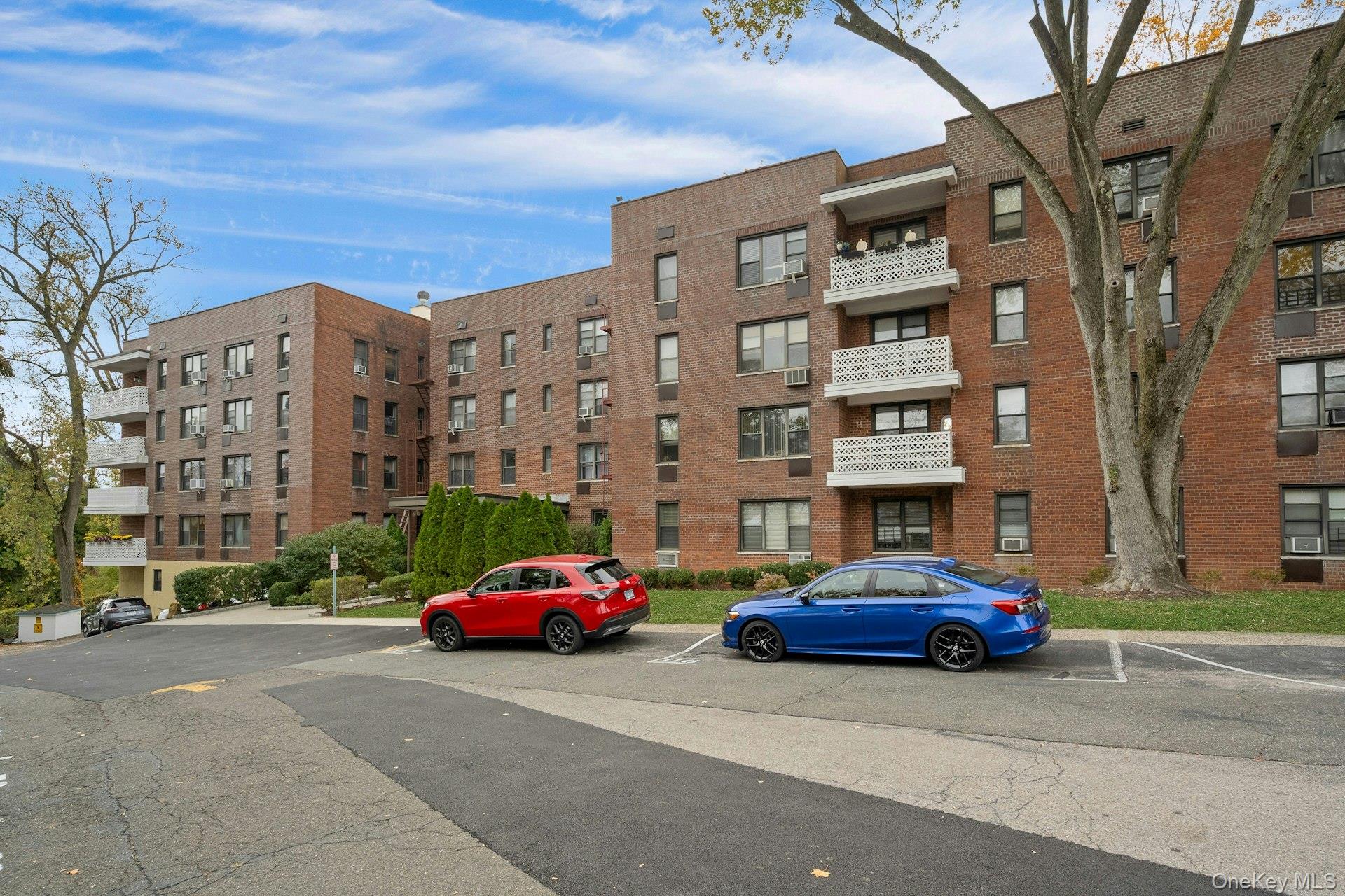 1 Remsen Road, Unit 1F Yonkers, NY 10710 - Photo 2 of 19 Front of Building, Main Entrance with view of parking lot.