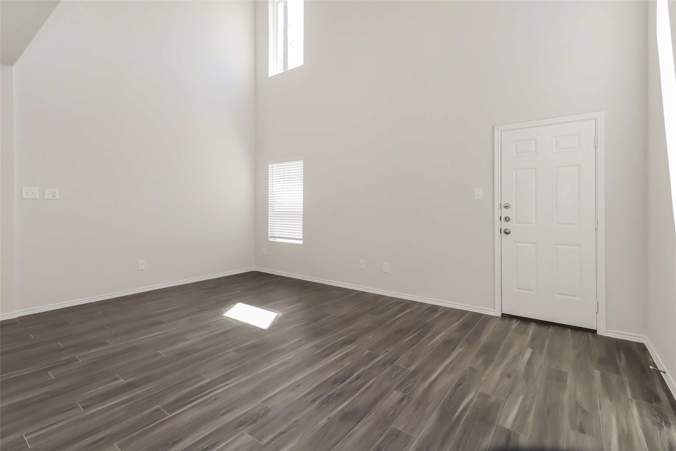 15329 Estrella Road East Houston, TX 77073 - Photo 5 of 15 a view of empty room with wooden floor and fan