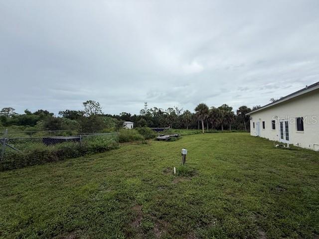 1799 East Manasota Beach Road Englewood, FL 34223 - Photo 20 of 50 a view of a house with a yard