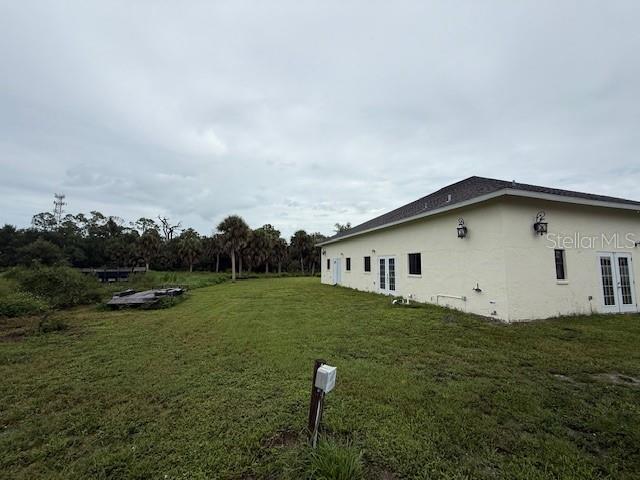 1799 East Manasota Beach Road Englewood, FL 34223 - Photo 21 of 50 a house view with garden space