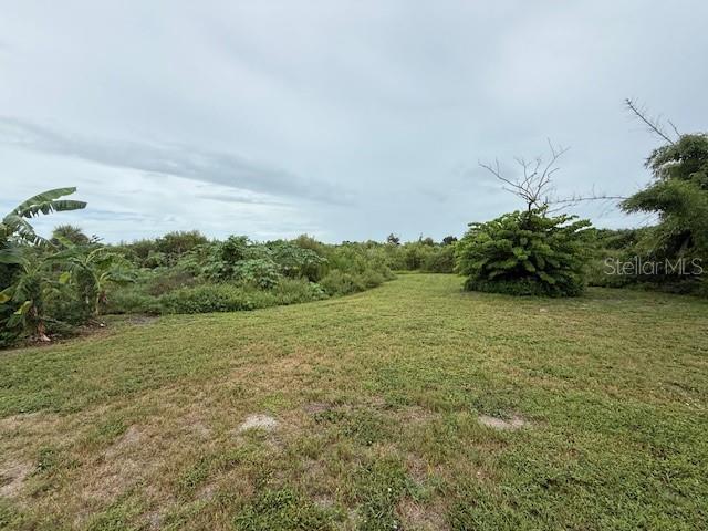1799 East Manasota Beach Road Englewood, FL 34223 - Photo 24 of 50 a view of an outdoor space and a yard