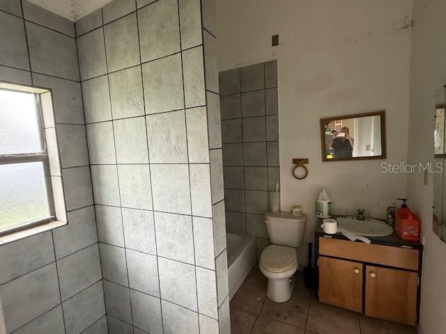 1799 East Manasota Beach Road Englewood, FL 34223 - Photo 33 of 50 a bathroom with a toilet sink and shower