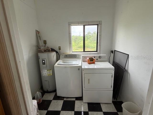 1799 East Manasota Beach Road Englewood, FL 34223 - Photo 34 of 50 a utility room with dryer and washer
