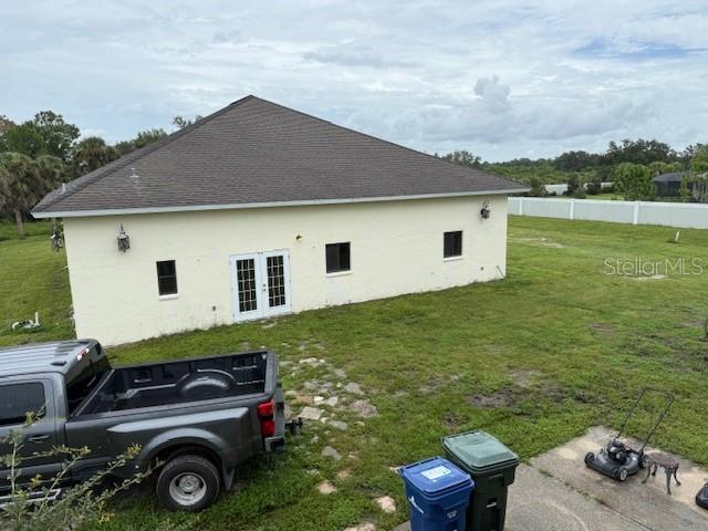 1799 East Manasota Beach Road Englewood, FL 34223 - Photo 41 of 50 a house view with a garden space