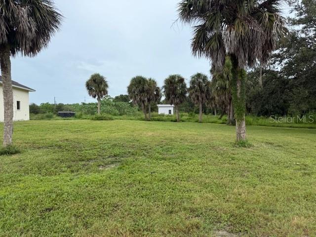 1799 East Manasota Beach Road Englewood, FL 34223 - Photo 10 of 50 a big yard with lots of green space
