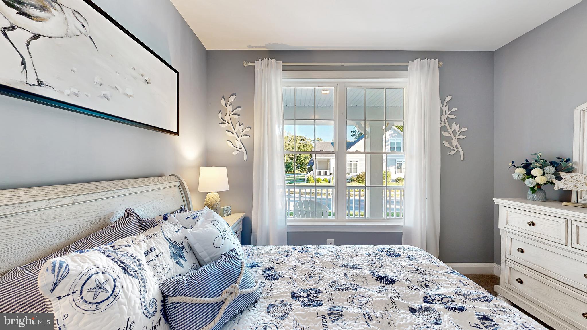 8 Antlered Way Georgetown, DE 19947 - Photo 14 of 19 a bed room with a bed and a window