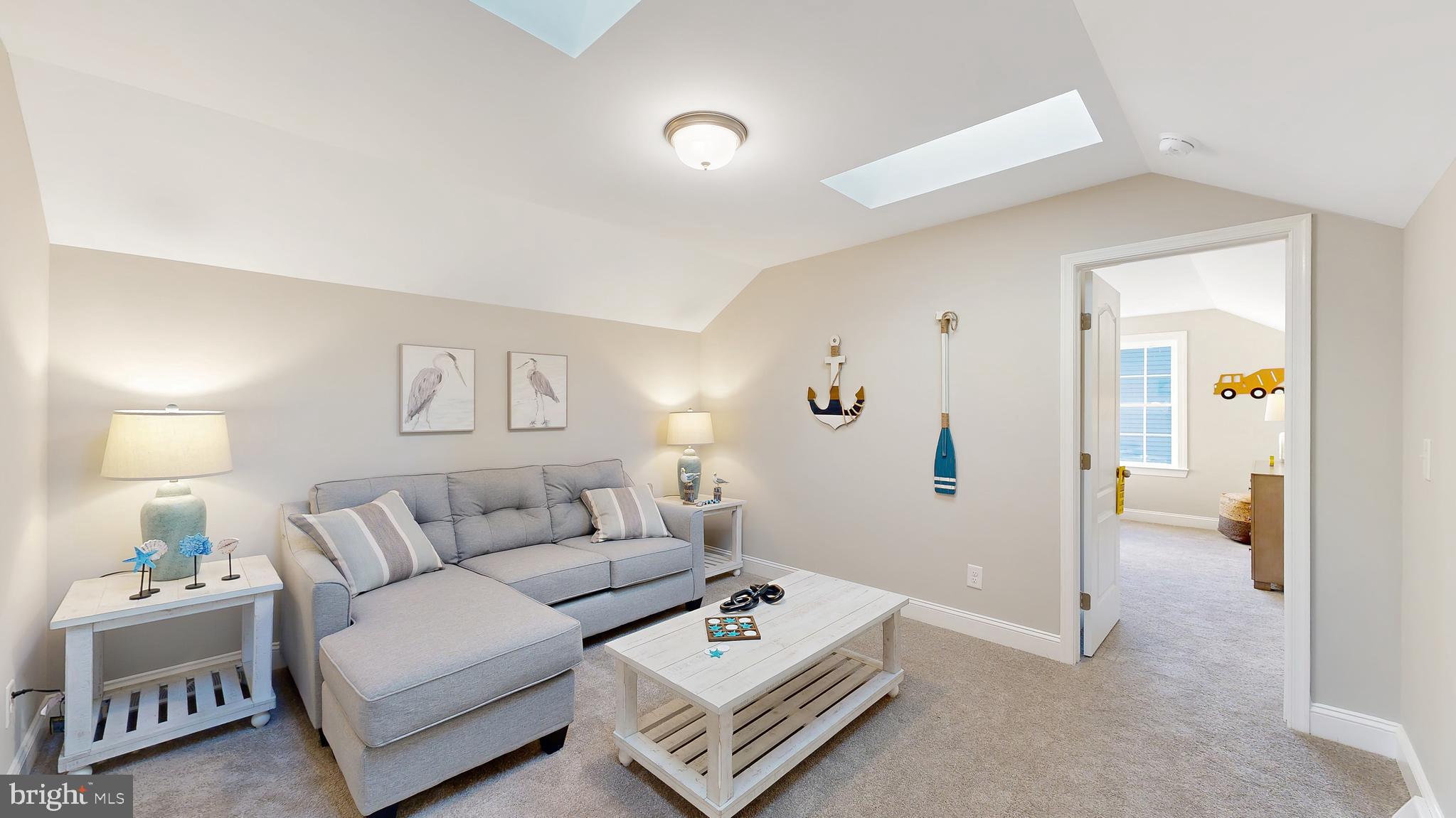 8 Antlered Way Georgetown, DE 19947 - Photo 17 of 19 a living room with furniture and a table
