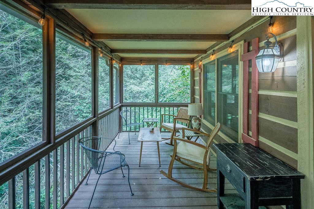 166 Mountain Ivy Lane Boone, NC 28607 - Photo 18 of 23 a view of balcony with couch