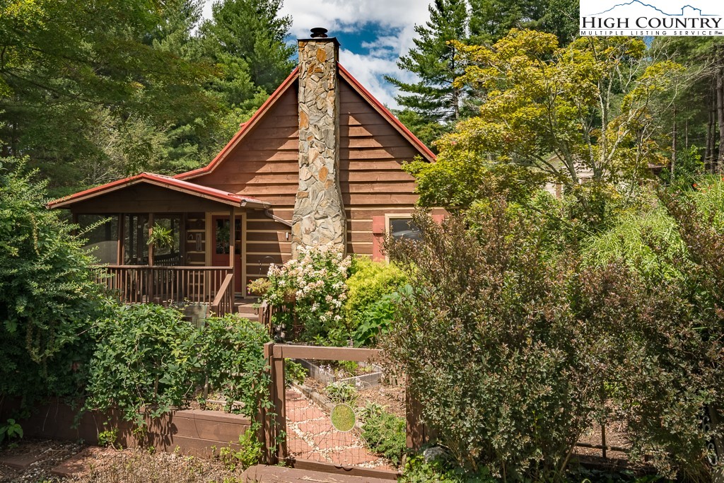 166 Mountain Ivy Lane Boone, NC 28607 - Photo 22 of 23 a view of a house with backyard
