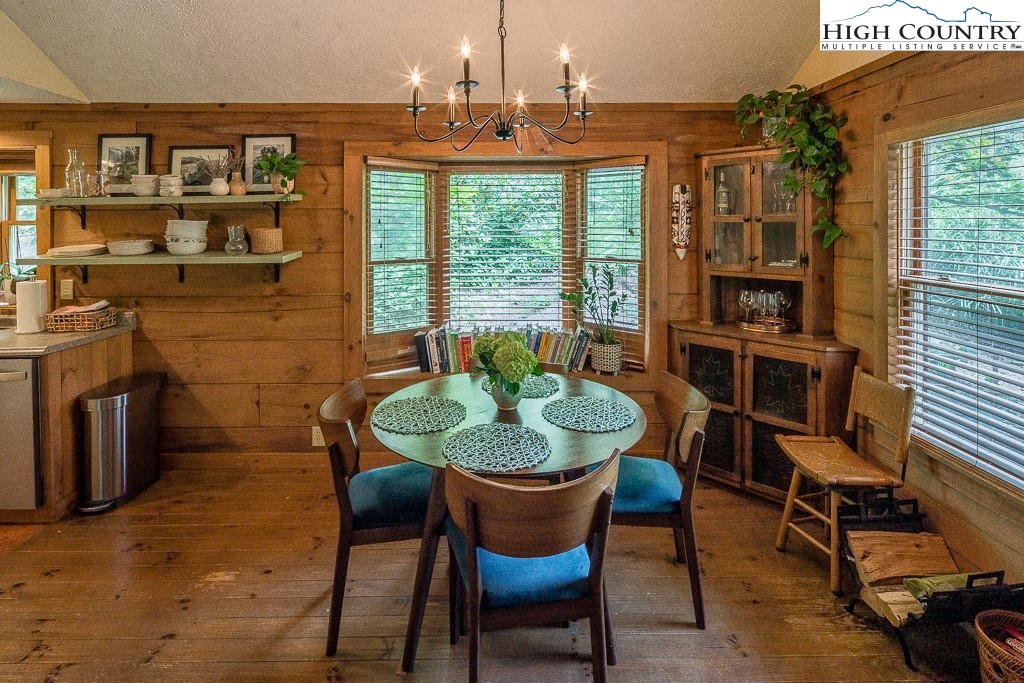 166 Mountain Ivy Lane Boone, NC 28607 - Photo 7 of 23 a dining room with furniture and chandelier