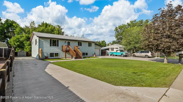 a childrens park with lots of swings and slides