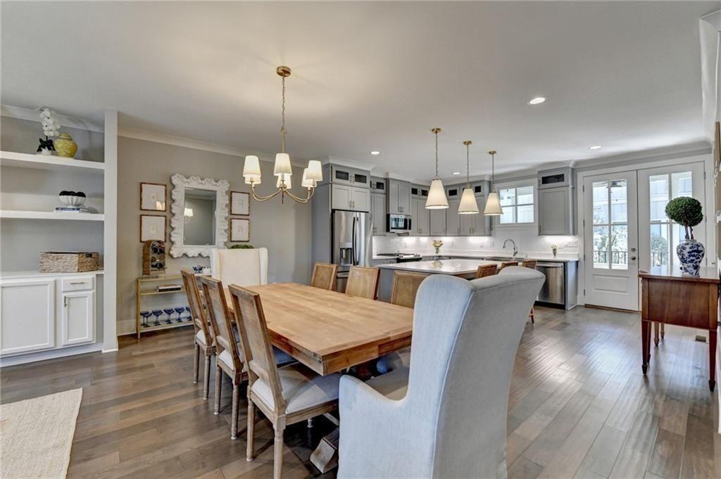 6065 Cushing Circle Norcross, GA 30071 - Photo 13 of 44 a dining room with furniture and wooden floor