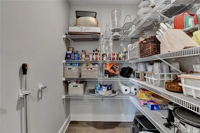 a kitchen with stainless steel appliances granite countertop a sink and stove